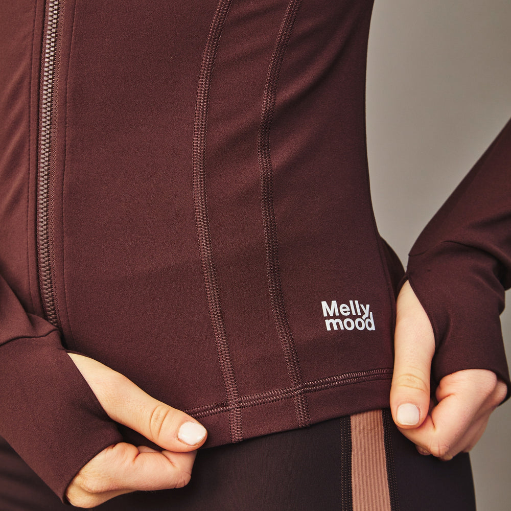 
                      
                        Chaqueta Deportiva Dri fit Café Oscuro
                      
                    